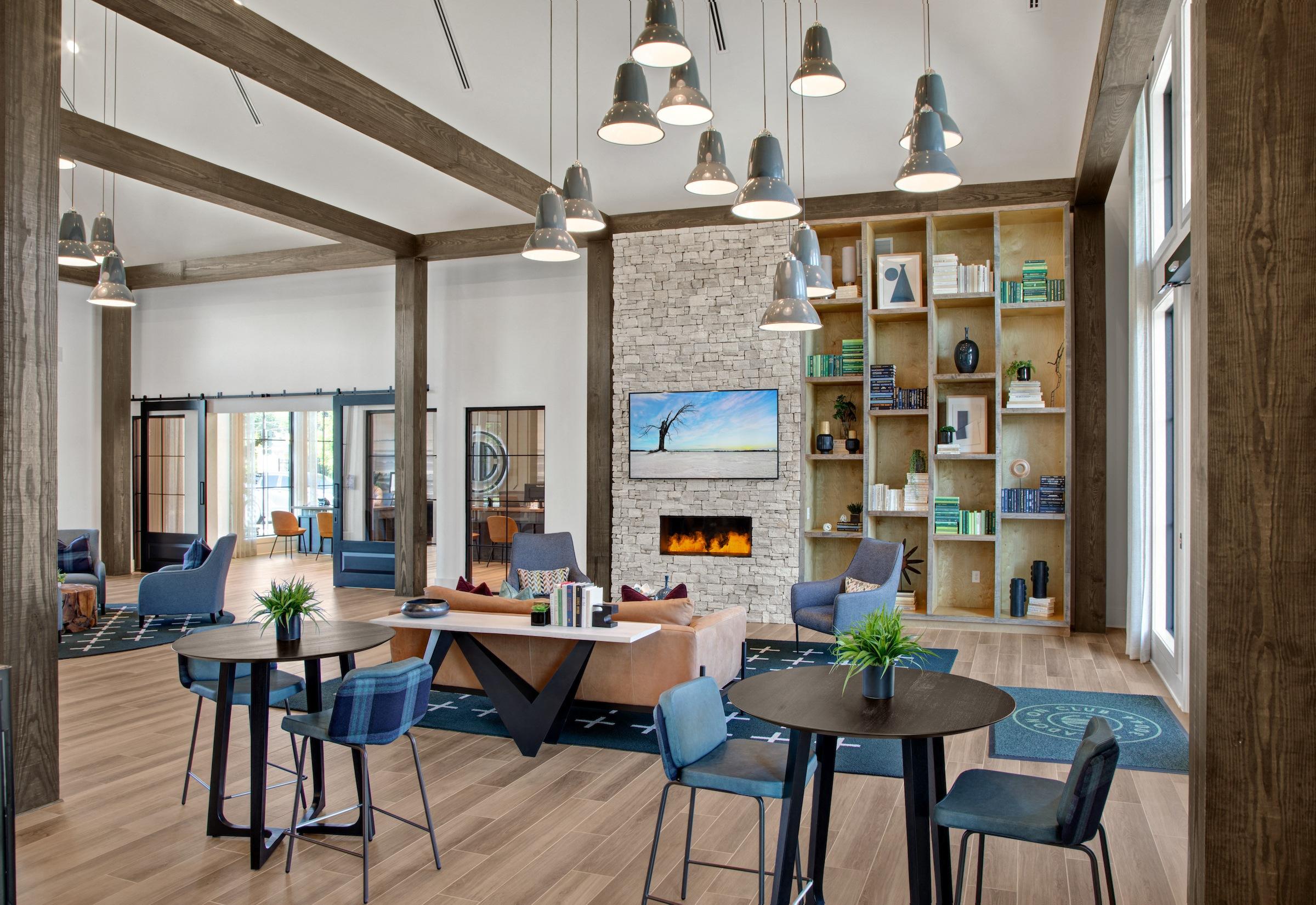 a room filled with furniture and a large window