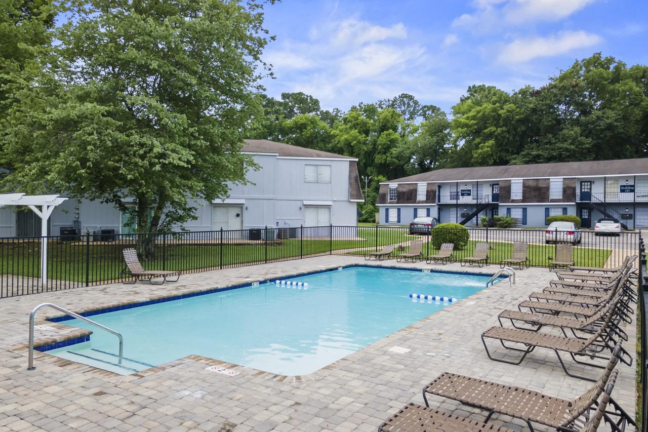 our apartments have a resort style pool with chaise lounge chairs