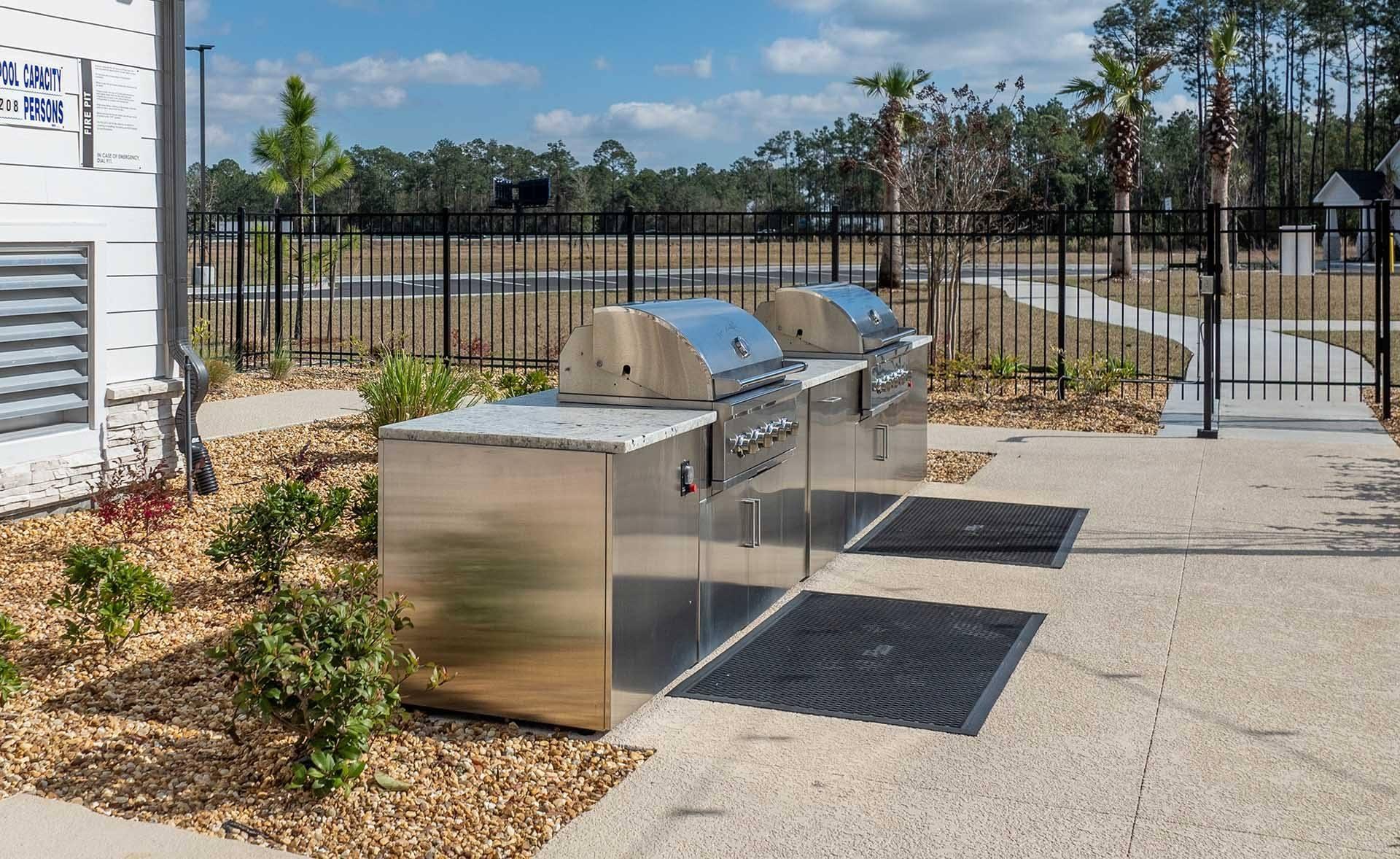 A metal grill is in front of a sign that says "School District 12".