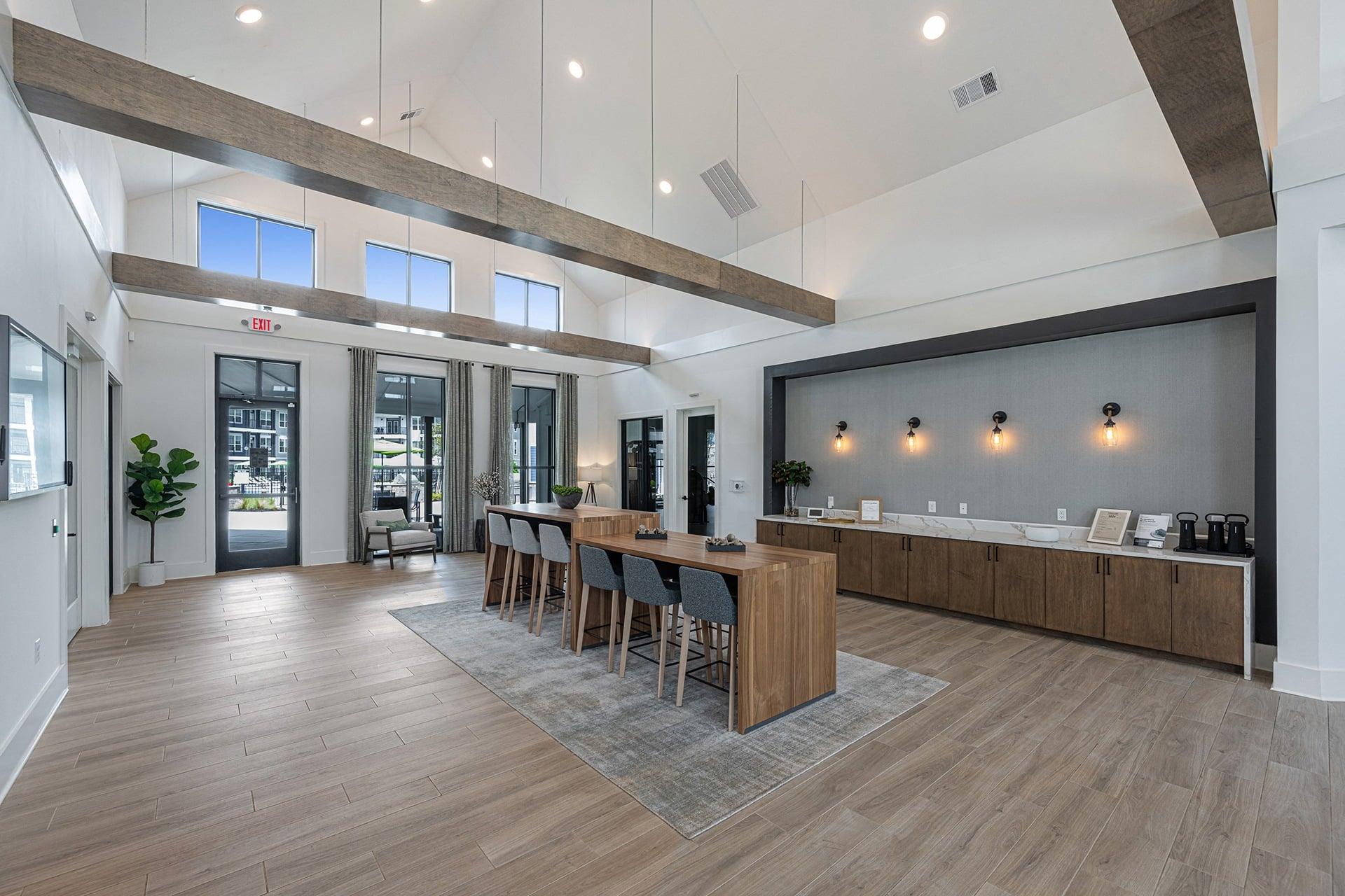 a large kitchen and dining room with a large table and chairs