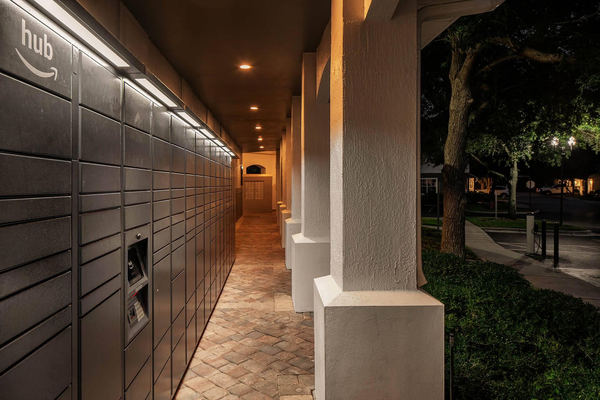 a long hallway with tiles on the side of a building