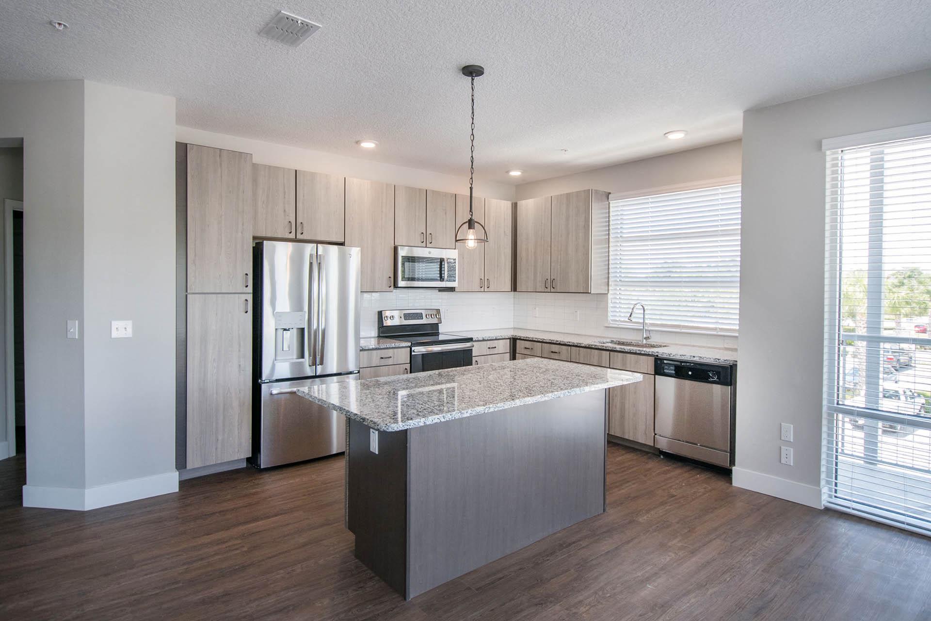 Model_Kitchen and Dining at The Parker at Maitland Station, Maitland, FL, 32751