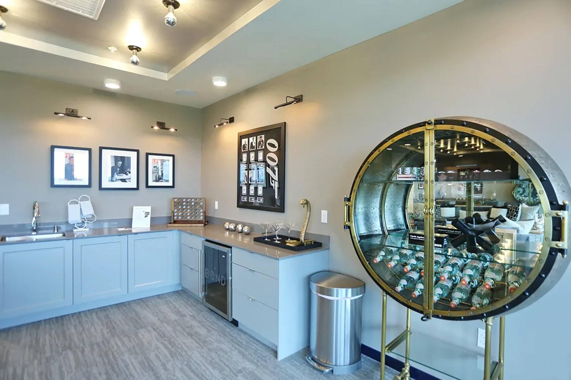 a tasting room with a glass display case in the corner