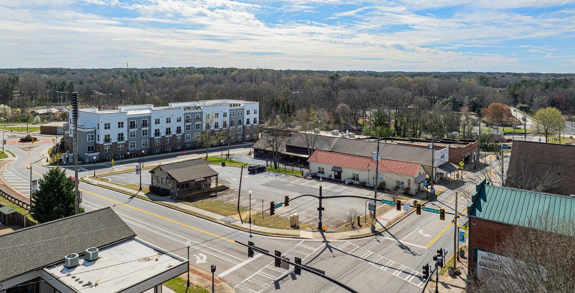 an aerial view of a city street and buildings