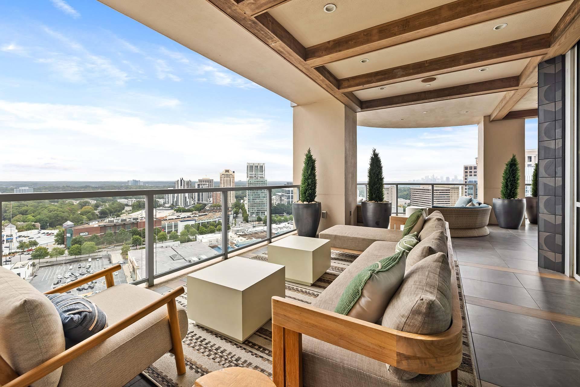 A modern living room with a view of the cityscape.