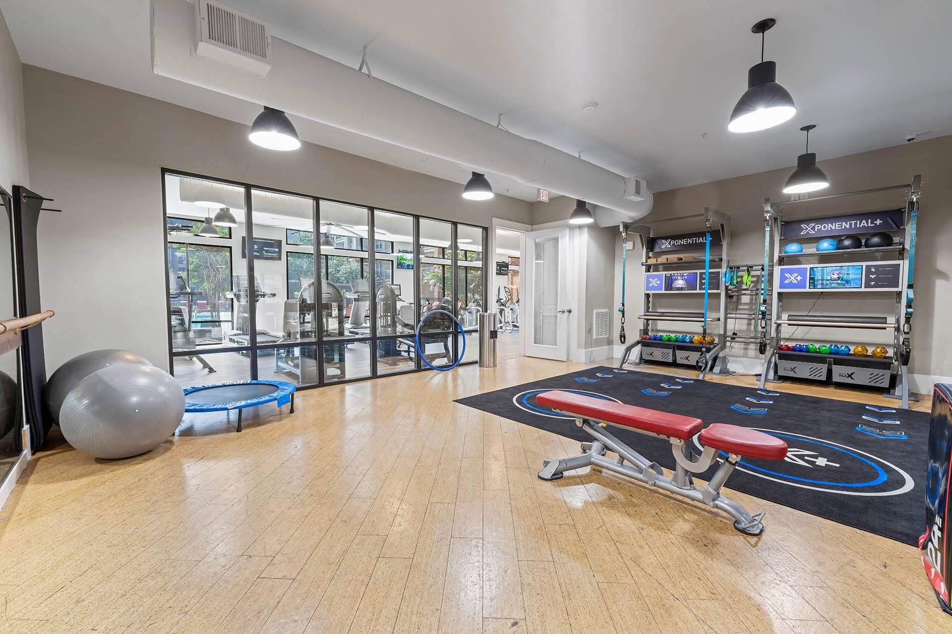 the gym at the flats at big tex apartments